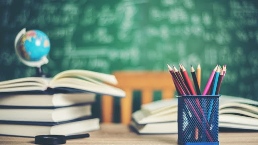 Book with green board background